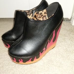 Iron Fist fire sign flame wedges